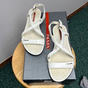 Prada white sandals price was $410 but i bought on sale at Nordstrom for 295.98